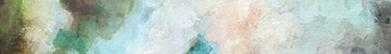 close-up photo of a paintbrush mixing paint on a wooden palette