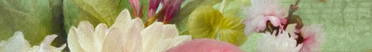 close-up photo of a paintbrush mixing paint on a wooden palette