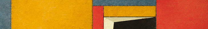 close-up photo of a paintbrush mixing paint on a wooden palette