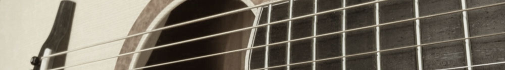close-up photo of an accoustic guitar