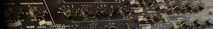 close-up photo of a violin on a dark background